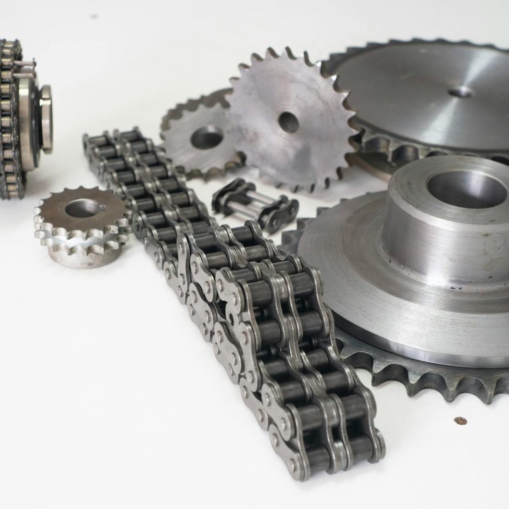 Precision chain and gears on a white background